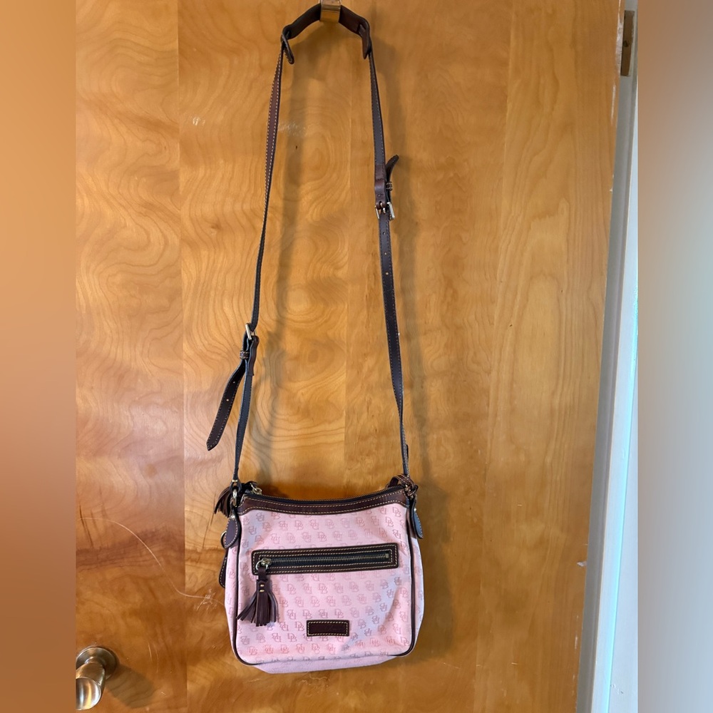 Dooney & Bourke Marigold Signature Crossbody Bag. pink